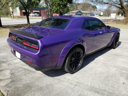 Purple Dodge Challenger with high-performance ceramic window tint and windshield film by Glass Tiger Tinting Loganville GA